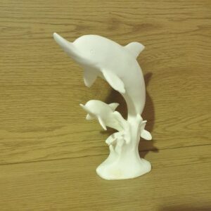 white dolphin statue 2